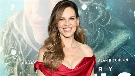 Hilary Swank, 49, dazzles in busty off